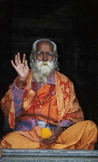 A Sadhu giving the traditional belssing 