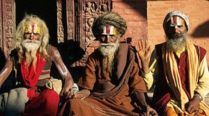 A trio of Sadhus in the late afternoon sun, Durbar Square